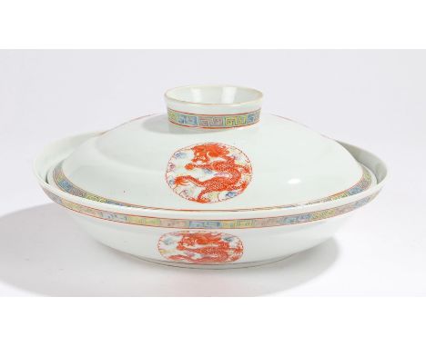 Chinese porcelain bowl and cover, decorated with dragon roundels in enamel and a geometric edge, six character mark to the li