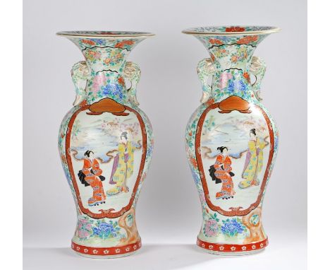 Large pair of Japanese porcelain Meiji period vases, with flower head design to the wide lip above baluster bodies and grape 