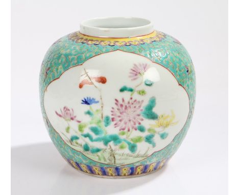 Chinese porcelain ginger jar, Canton enamels with scroll and flower design, red seal mark to the base, 17.5cm high