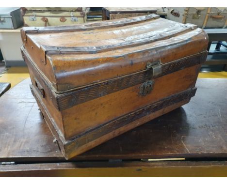 * Metal framed trunk case - with ornate patten to outside and distint blue interior