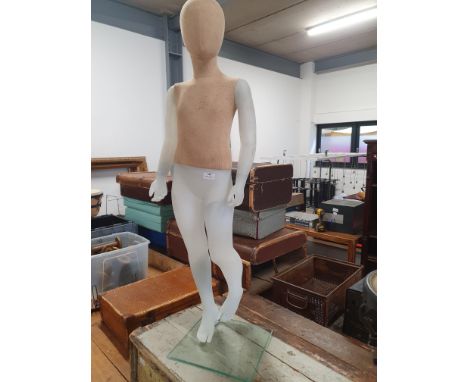 * child mannequin on stand 