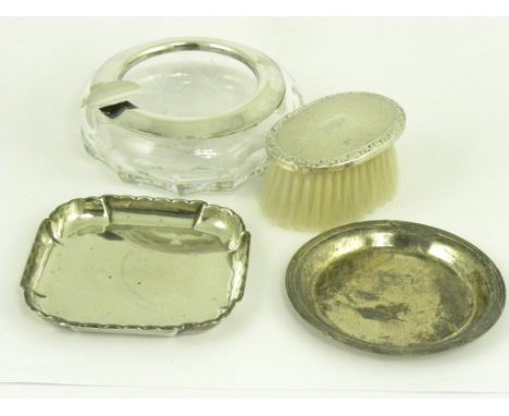 AN ELIZABETH II SILVER COASTER, SHEFFIELD 2000, A SQUARE SILVER ASHTRAY, A SILVER RIMMED GLASS ASHTRAY AND A SILVER CHILD'S B