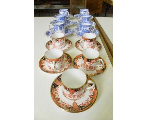 SIX ROYAL CROWN DERBY BLUE AVES PATTERN COFFEE CUPS AND SAUCERS AND A SET OF FIVE ROYAL CROWN DERBY JAPAN PATTERN COFFEE CANS