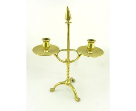 A BRASS TRIPOD CANDELABRUM 