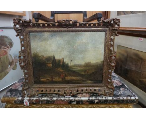 European School, late 18th century, figures by a village, oil on panel, 30 x 40cm, in a carved giltwood frame.&nbsp; 