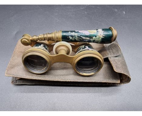 A good pair of French painted enamel and gilt brass opera glasses, with telescopic handle, in leather pouch. 