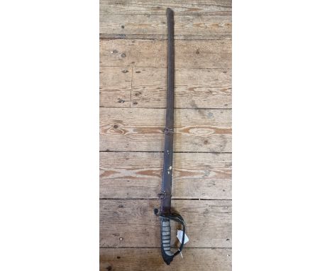 A Victorian 1845 pattern Infantry officer's sword and steel scabbard, having etched 80cm blade, by William Buckmaster. 