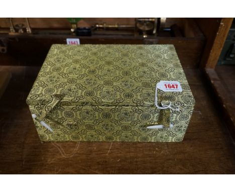A pair of Chinese green jade bowls, 10cm diameter, with hardwood stands, in fitted box.&nbsp; 