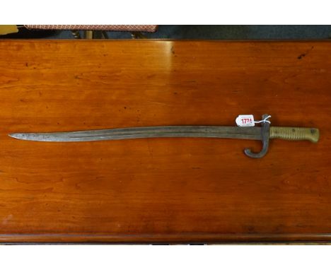 A French Chassepot M1866 sword bayonet, dated 1874. 