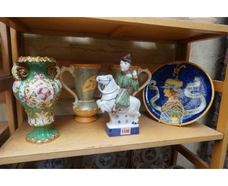 A maiolica plate, 25.5cm diameter; together with a Rye pottery figure; a pair of Burleigh ware jugs, 21cm high; and a Coalbro