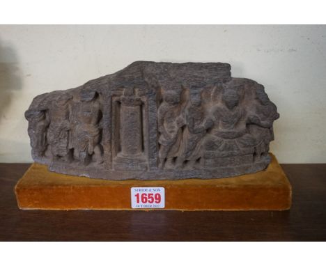 Antiquities: a schist relief panel of figures, possibly Gandhara, 25.5cm wide.&nbsp; 