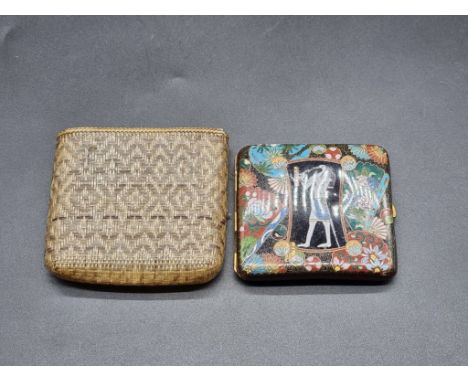 An unusual Japanese cloisonne enamel cigarette case, the hinged cover decorated with an Egyptian figure, 7.8 x 8.5cm. 