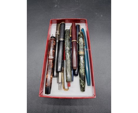 A collection of vintage pens,&nbsp;to include four with 14ct nibs. (12)&nbsp; 