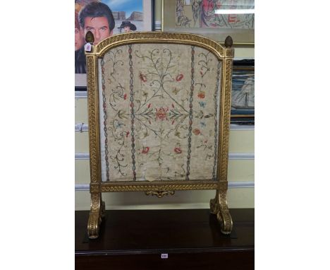 A Louis XVI carved giltwood firescreen,&nbsp;with needlework panel, 104 x 75cm.&nbsp; 