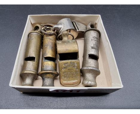 Five vintage whistles, to include a 'City Police or Fire Whistle'. (5) 
