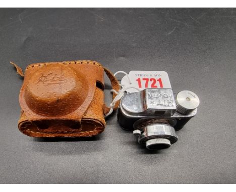 Cameras: a miniature 'spy' camera by HIT, in original leather case. 