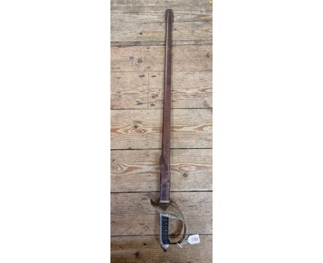 A George V 1897 pattern Infantry officer's sword and leather scabbard, having 83cm etched blade, signed Johns & Pegg, Cliffor