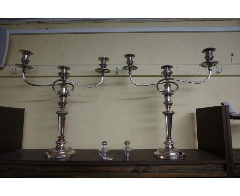A pair of 19th century Old Sheffield plate twin branch candelabra, 48cm high.&nbsp; 