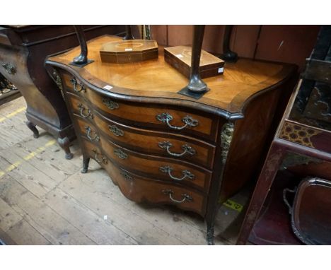 A Louis XV kingwood, line inlaid and rosewood crossbanded serpentine commode,&nbsp;with ormolu mounts, 115cm wide. 