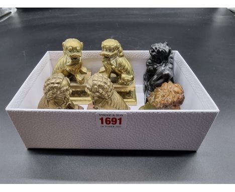 Two pairs of Chinese brass qilins, 9.5cm high; together with a similar jade example; and another soapstone example. (6) 