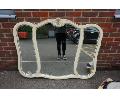 A modern overmantel mirror, with gilt decoration, 130cm wide. 