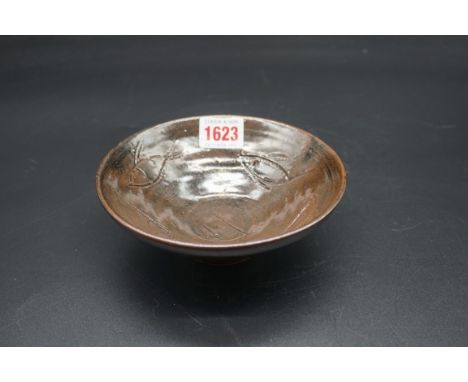 Studio Pottery: a Trevor Corser, Leach Pottery dish, incised with fish, 15cm diameter. 
