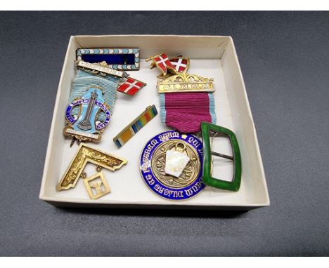 Medals: two silver gilt and enamel Masonic badges; together with a green enamel shoe buckle; Danish enamel badges and others.