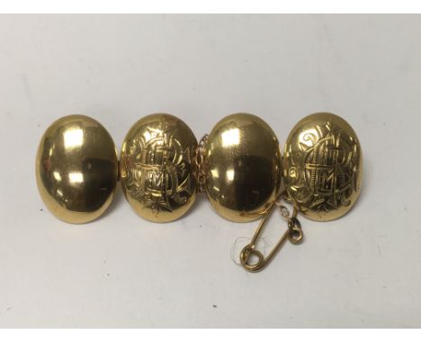 A 18 ct gold four button brooch 14 grams approx