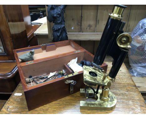A cased R&amp;J Beck brass microscope model 7970 with additional Fittings and lenses.