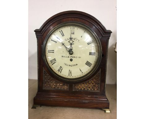 A Georgian mahogany bracket clock the painted dial with Roman numerals and named Garrett Balls pond Rd Islington. Dial 20 cm 