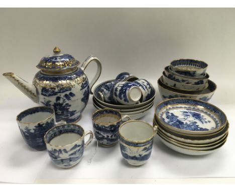 A collection of Oriental blue and white tea service items.
