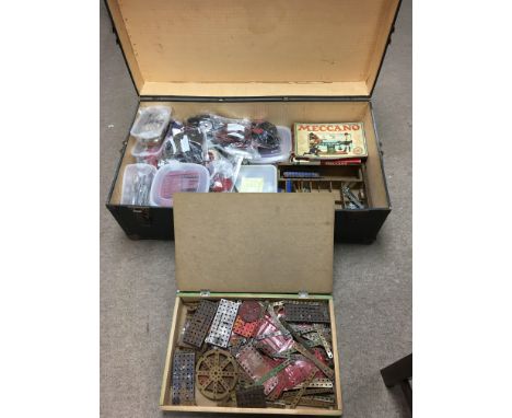 A large trunk containing a large quantity of Meccano, including vintage Red, Green Meccano, also Motors, Wheels, Gears, Pulle