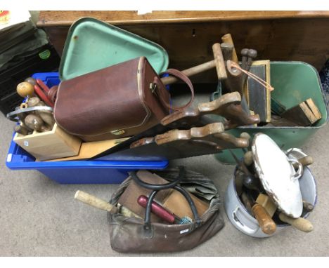 A collection of tools including wood planes, chisels etc.