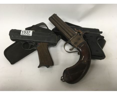 A vintage Record cap gun and 2 additional replica guns.