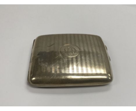 A silver cigarette case, Birmingham hallmarks.