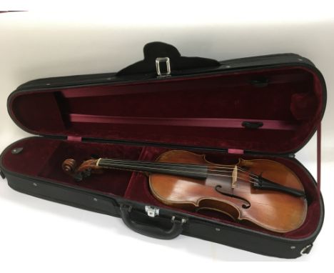 A good 19th Century German violin by Louis Lowendahl (stamped LL within oak leaves on button). Comes supplied with carry case