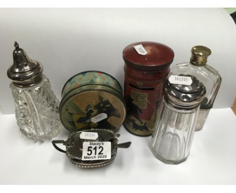 A hallmarked silver salt pot, silver topped bottle tins etc.