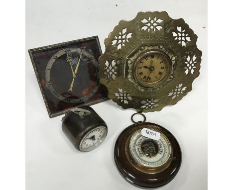 3 vintage bedside clocks and a miniature wall barometer.