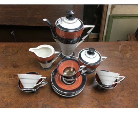 A 1930s Art Deco design silver overlaid coffee set.