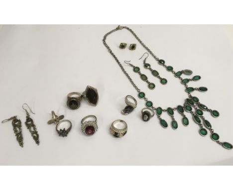 A group of silver and white metal jewellery