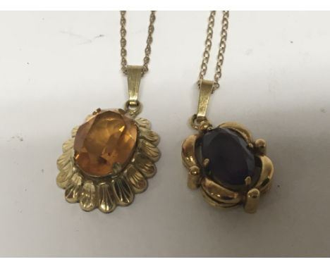 Two pendents set with citrine and amethyst coloured stones on gold chains (pendents unmarked not gold). (2) - NO RESERVE