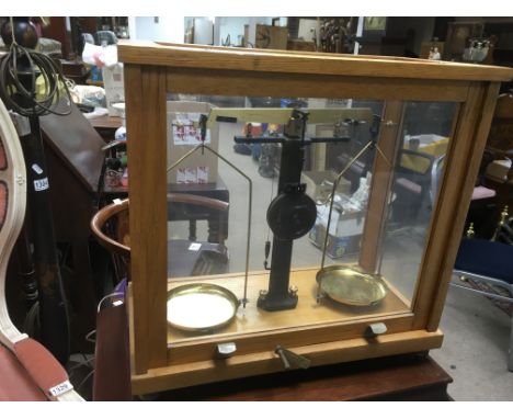 A set of beam balance scales.