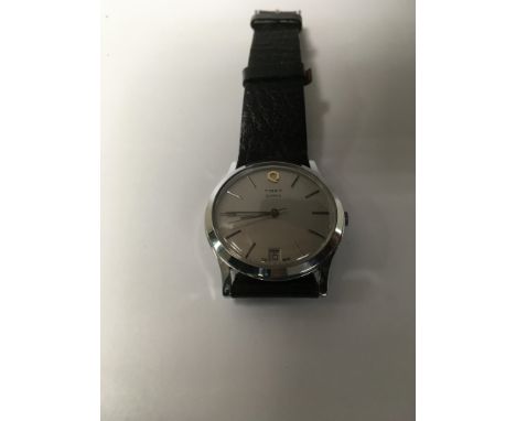 A timex quartz wrist watch with date aperture.