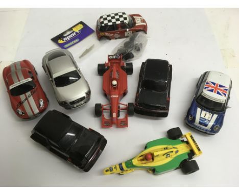 A small collection of Scalextric cars