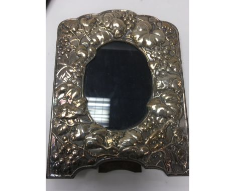 A silver photo frame of naturalistic design Birmingham hallmarks 1993 23 cm by 19 cm