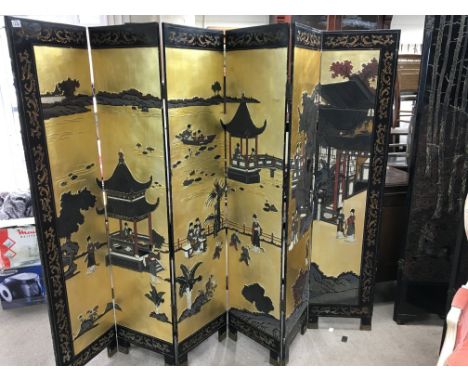 A Chinese 6 panel lacquered screen.