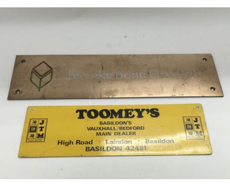 Two vintage metal advertising signs comprising one for Brooke Bond Oxo Ltd and the other for Toomey's, approx 30.5cm x 8cm an
