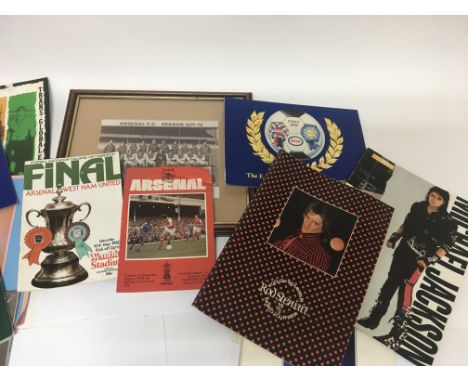 A collection of ephemera comprising football programs Esso World Cup coin collection concert programs including ABBA Michael 