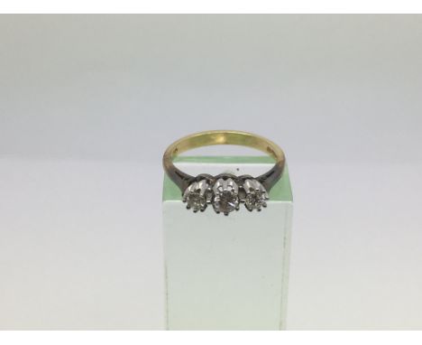 An 18ct gold ring set with three diamonds, approx 3.5g and approx size M-N.