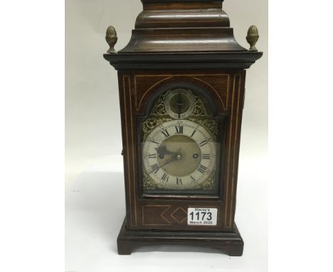 A Georgian style mantle clock the brass dial with chapter ring and Roman numerals  Maker w goodhall .